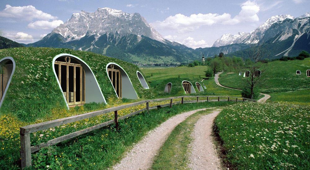 Vue paysage de plusieurs maisons de hobbit à la montagne